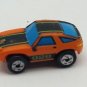 Small Micro Machine Plastic Porsche 928 in Orange with Black trim