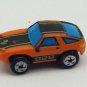 Small Micro Machine Plastic Porsche 928 in Orange with Black trim