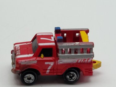 Small Micro Machine Datsun Fire Truck in Red with White Stripes Number 7