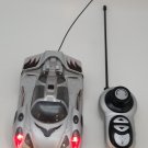 Remote Control Car Lights Up and Spins Silver *TESTED AND WORKING*