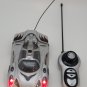 Remote Control Car Lights Up and Spins Silver *TESTED AND WORKING*