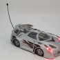 Remote Control Car Lights Up and Spins Silver *TESTED AND WORKING*