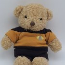 Vintage 1998 TM & C Bear with Gold Star Shirt and Black Shorts 9” Stuffed Animal