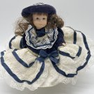 Porcelain Doll 7” Navy Dress White Lace Brown Hair Blue Eyes