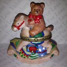 Teddy Bear Riding A Rocking Horse with Christmas Theme Presents Drum Ball Block