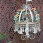 Delicate chandelier decorated with handmade majolica roses, murano .Italy