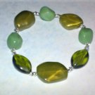 Green plastic bead stretch bracelet