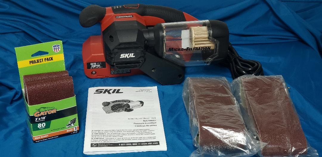 SKIL BELT SANDER 7510 3"X18" W/9 80 GRIT SANDING BELTS COMBO