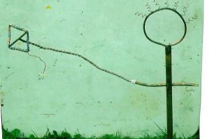 Boy holding kite   copper yard art