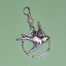Sparrow Bird over a Sterling Silver Hammered Circle Pendant
