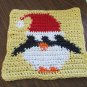 Christmas Crochet Penguin dishcloth yellow background