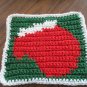 Christmas Crochet mitten dish cloth green background