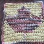 Crochet leaf dish cloth yellow background
