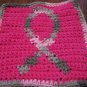 Crochet breast cancer ribbon dish cloth pink background
