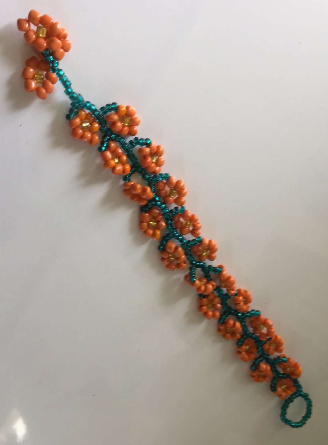 Handmade strap style orange flower bracelet