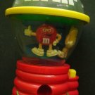 M & M Spinning Candy Dispenser on Red Base 9" x 5 1/2" x 4 1/2" Push Button