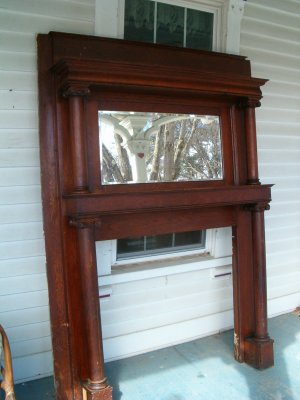 Victorian Fireplace Mantel This is a beautiful quartersawn oak mantle in original finish. This mantle is in very good condition. Has beveled mirror which is also in very good c