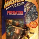 Predator figure - Kenner, dated 1994, diecast metal, MIP die cast movie figure
