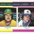 1975 Topps baseball card #311 ERA Leaders Jim Catfish Hunter & Buzz Capra NM