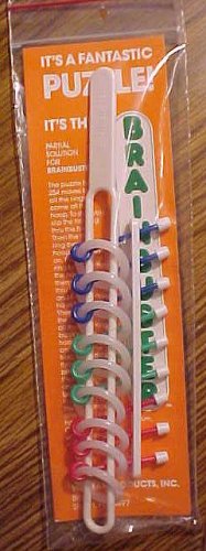 Brainbuster ring and stick puzzle - MIP, This one will drive you crazy!