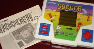 Classic 1989 Tiger Electronic Handheld LCD Soccer game, works great! w/ instructions