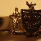 Regal looking shield style crest silver colored tie clip, beautiful condition
