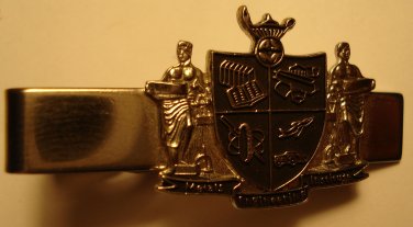 Regal looking shield style crest silver colored tie clip, beautiful condition