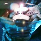 Centerpieces of sand, shells, tealights