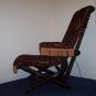 George Hunzinger Black, Walnut, and Patented Folding and Reclining Armchair
