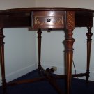 Berkey & Gay Furniture Co. Mechanical Swivel, Walnut Drop Leaf Victorian Parlor Table