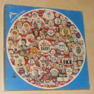 People's Choice 500 Piece Round Jigsaw Puzzle Circular Campaign Buttons Eaton 15-363-90 Sealed Bag