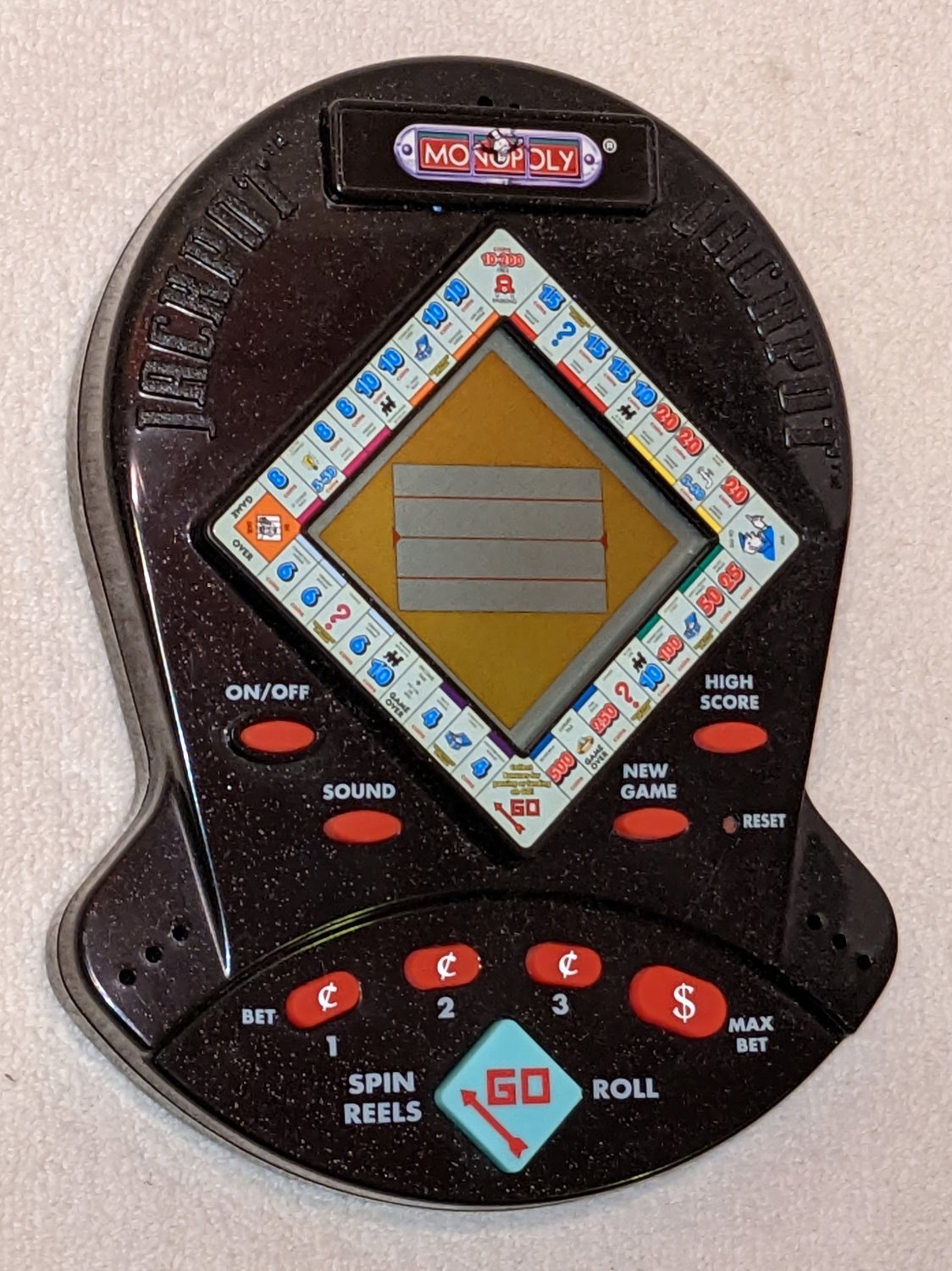 Monopoly Jackpot Electronic Handheld Game 41321-1 Battery Operated Working Condition 1999