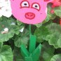 Pink pig  garden flower wood