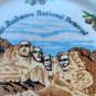 EUC South Dakota Mt. Rushmore Pinecones Porcelain Gold Trim Souvenir Plate, 8"
