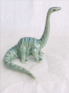 Porcelain Miniature Dinosaur Looking Forward