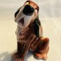Seated Bloodhound Dog with Bloodshot Eyes Ceramic Figurine - Vintage