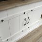 Sauder Farmhouse Sliding Door TV Stand for TVs Up to 70"", Soft White Finish