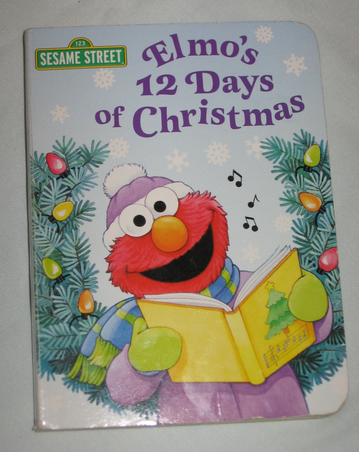 Sesame Street Elmo's 12 Days of Christmas Board Book by Sarah Albee and Sarah Willson