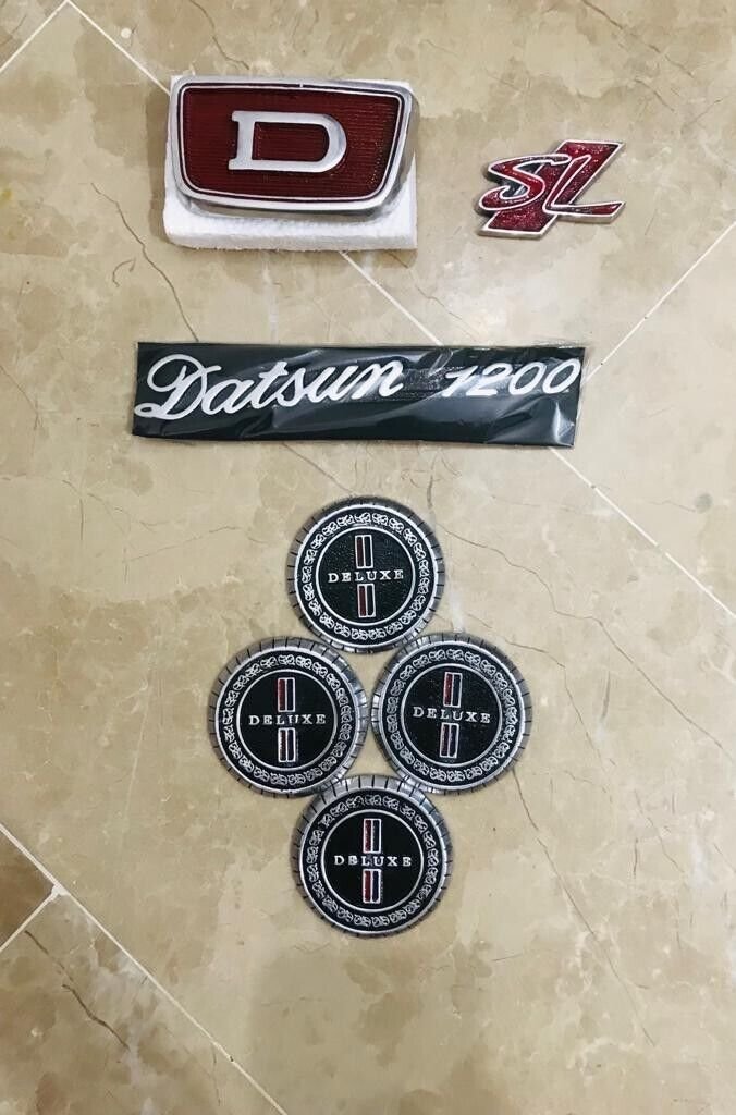 DATSUN 1200, Bluebird DELUXE And SL Emblem Set Of 7 Piece
