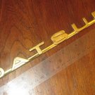 Datsun 1300 Digi Emblem