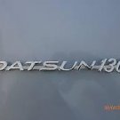 Datsun 1300 Emblem