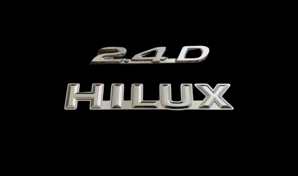 HILUX AND 2.4D 2 PIECE EMBLEM FOR 1986 MODEL