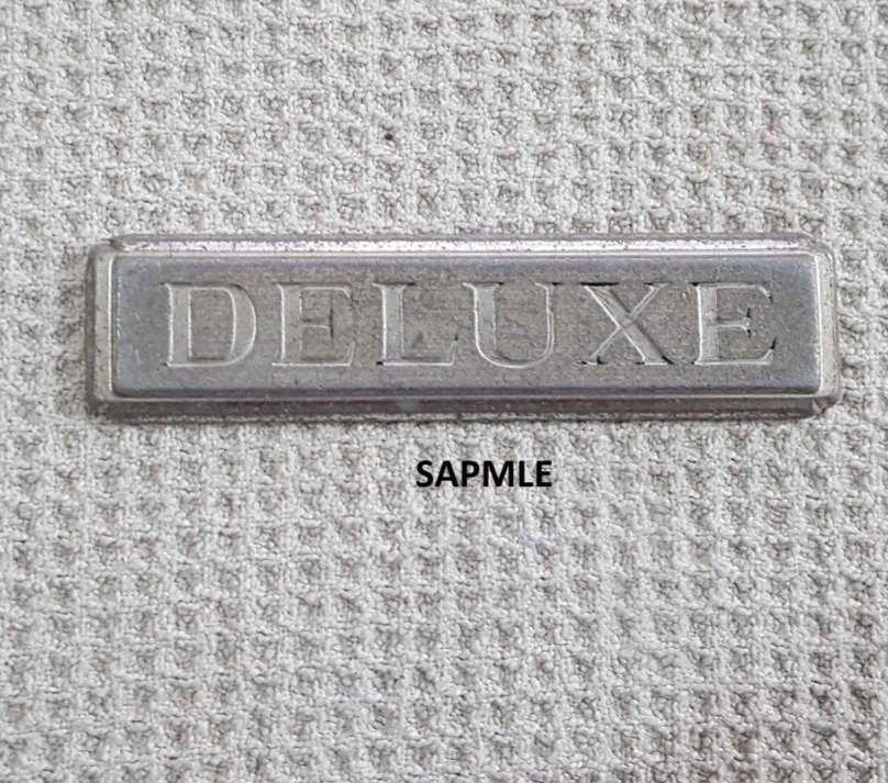 Old Delux Car Emblem