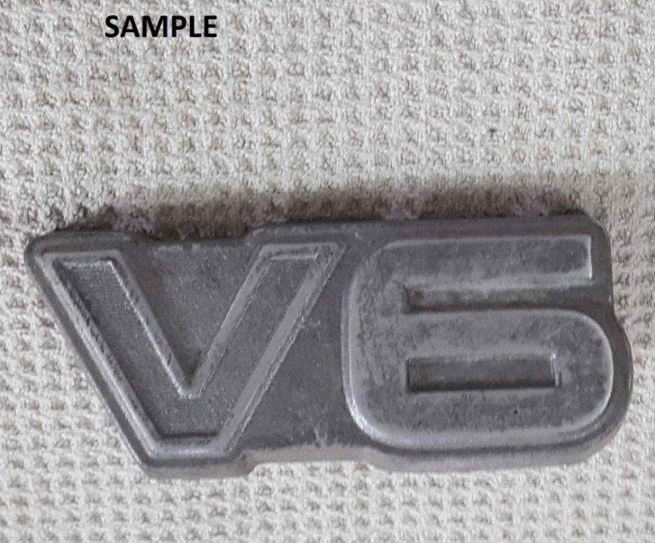 V6 Emblem