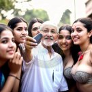 modern Ghandi with fans