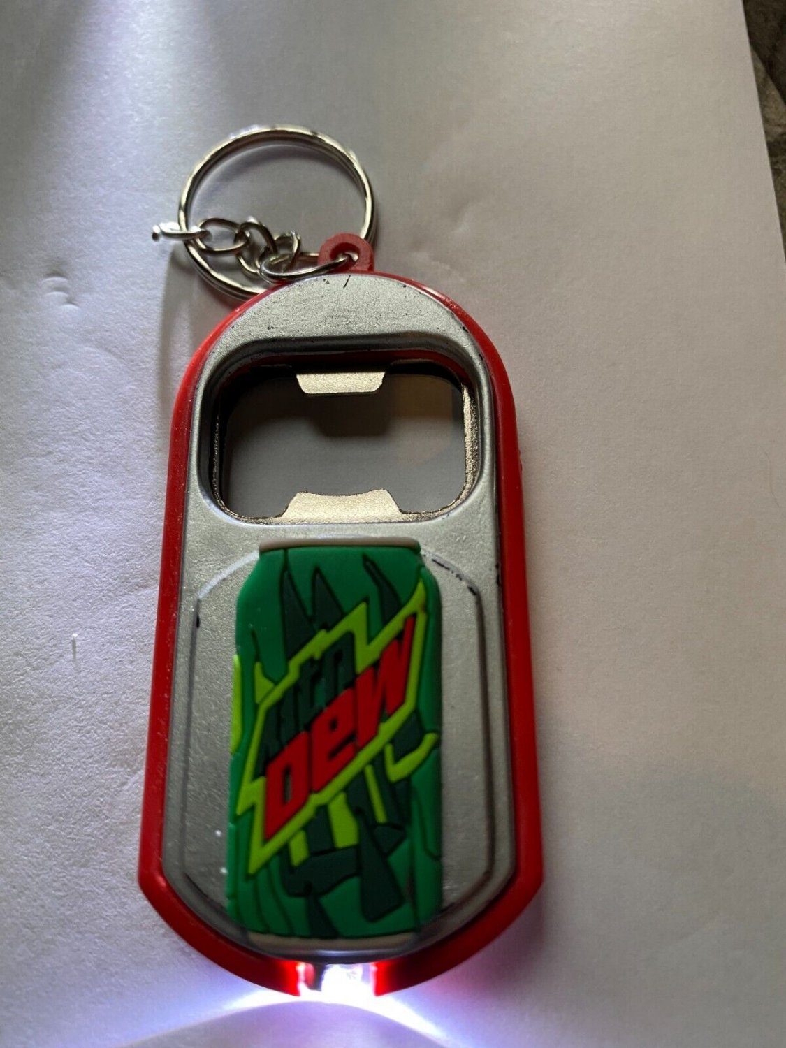 Mtn Dew multipurpose keychain, bottle opener, light Please read profile