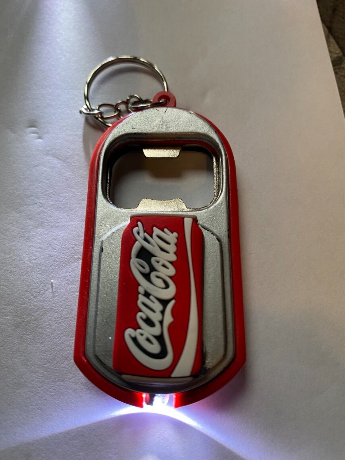 CocaCola multipurpose keychain, bottle opener, light Please read profile