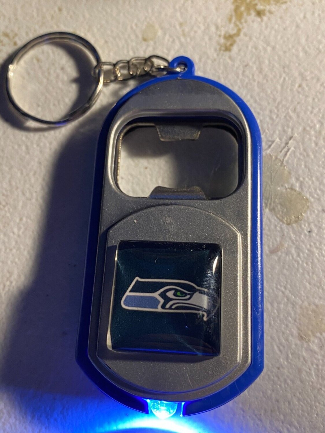 Seattle Seahawks multipurpose keychain, bottle opener, light