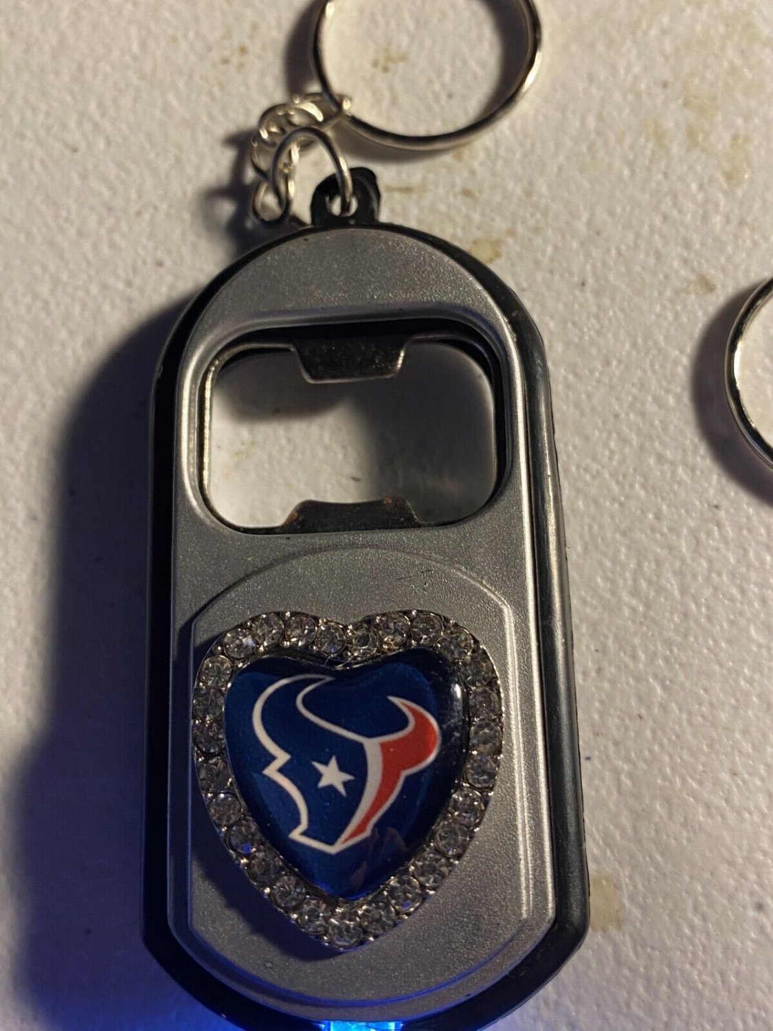 Houston Texans multipurpose keychain, bottle opener, light