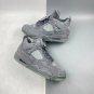 Kaws X Nike Air Jordan 4 Grey Suede Sneaker